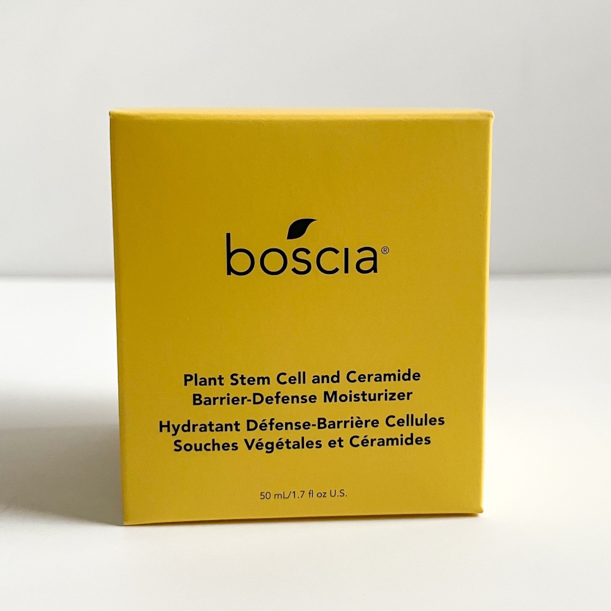 yellow box with Boscia logo