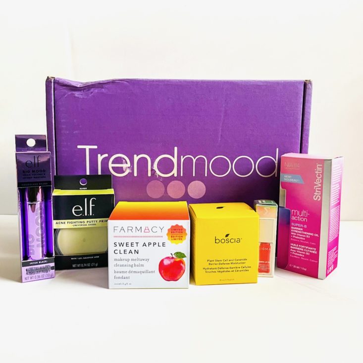 group shot showing box contents centered around the box displaying the Trendmood logo