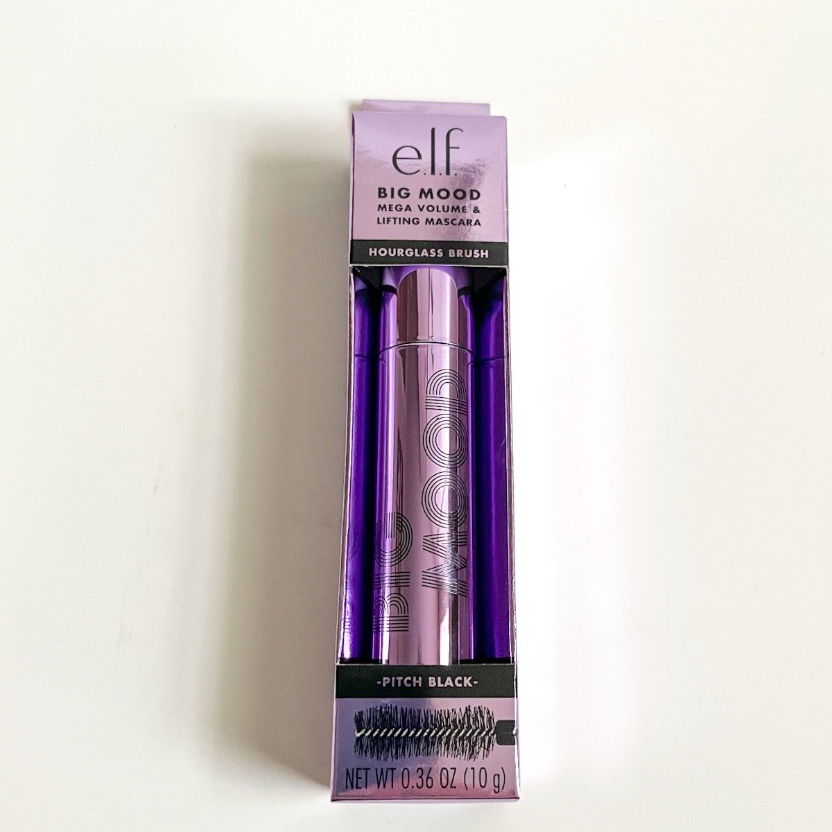 shiny purple mascara tube inside of purple box