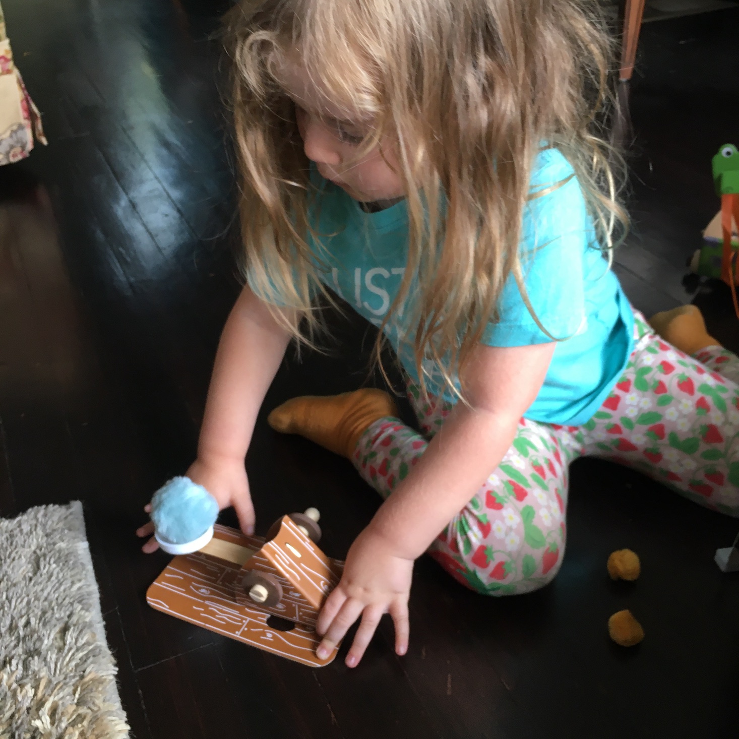 Kid trying out catapult they just made from Koala Crate Medieval Fun