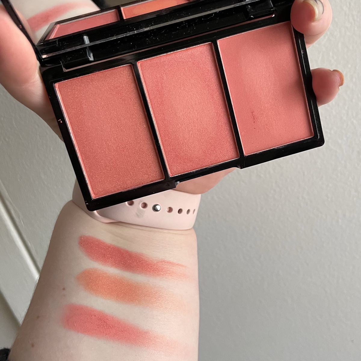 swatches of blushes on arm