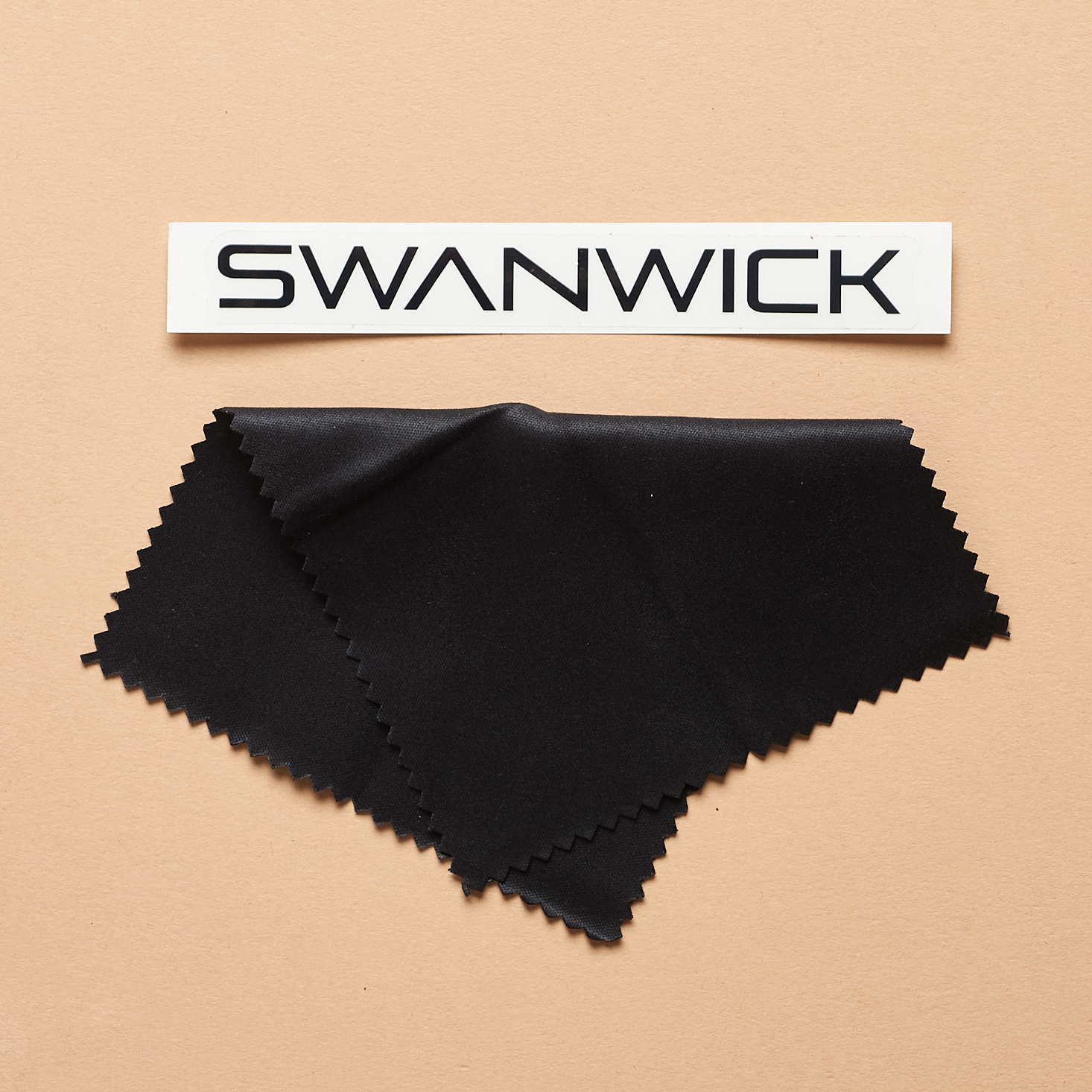 Swanwick sticker and glasses cloth from Breo Box Fall 2021