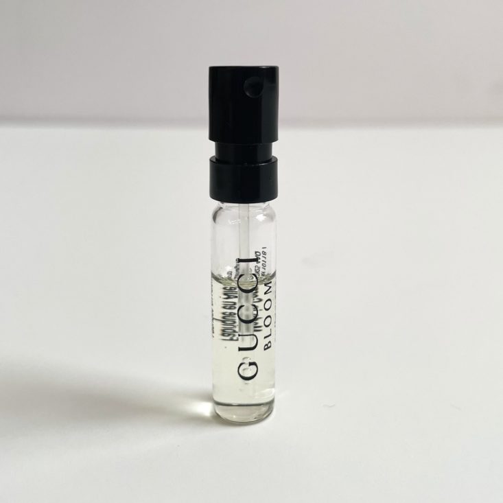 clear perfume vial with black top