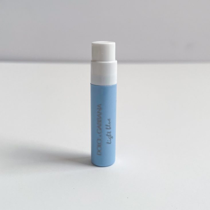 blue and white perfume vial