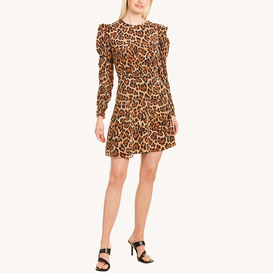 Woman in leopard print dress