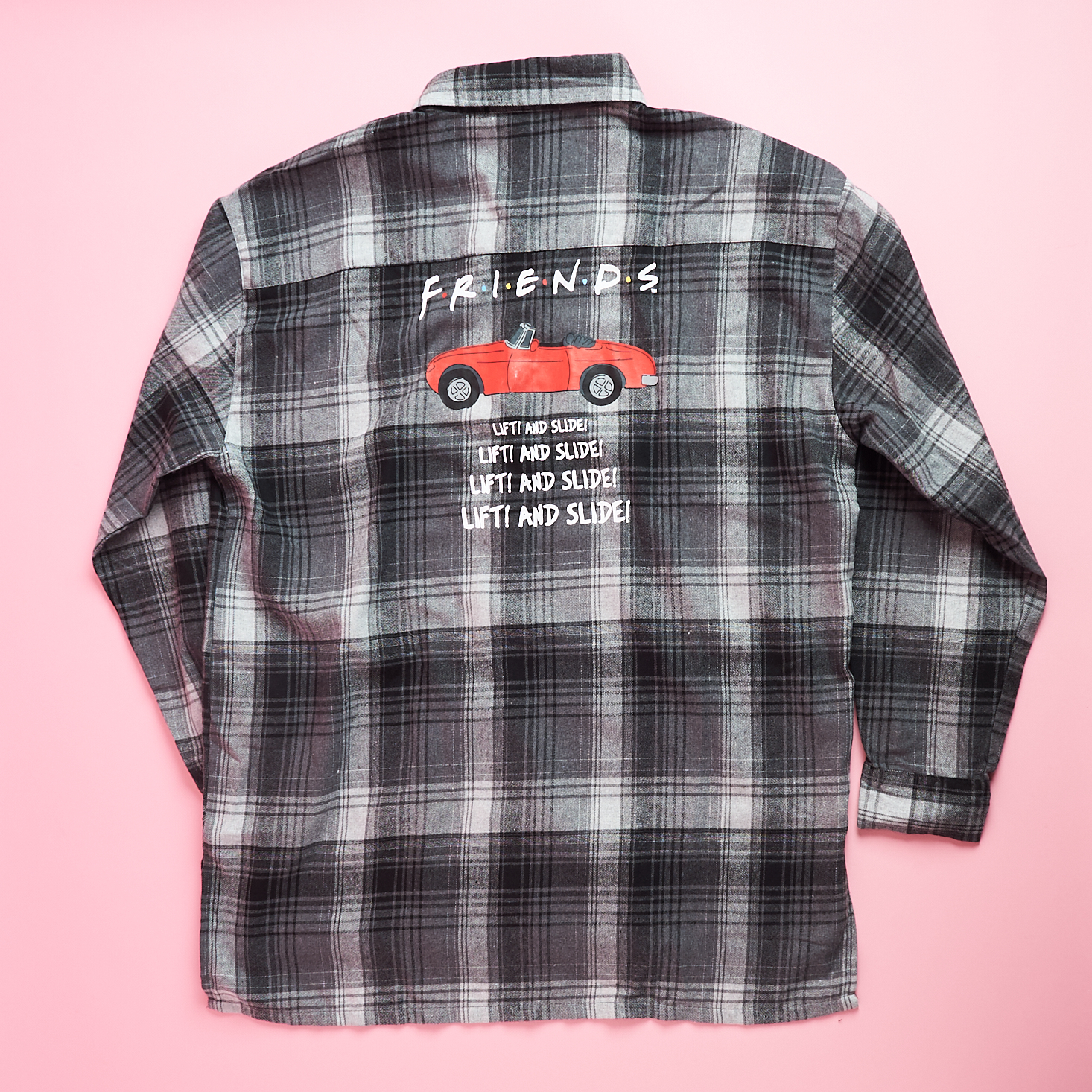 back of oversized plaid shirt friends box fall 2021