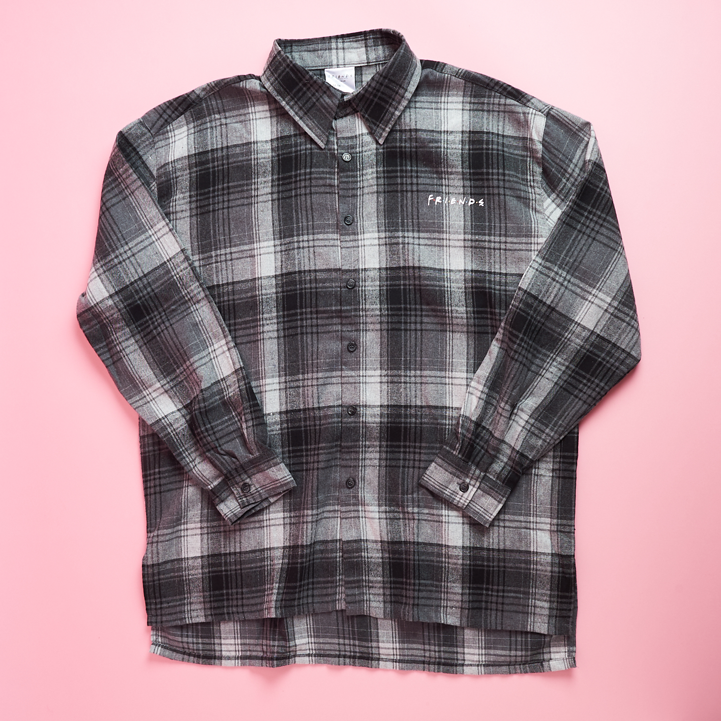 front of oversized plaid shirt friends box fall 2021