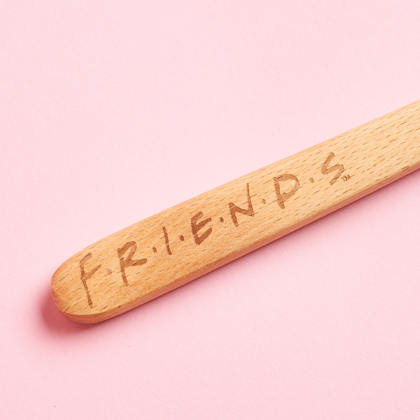 logo on Friends wooden spoon