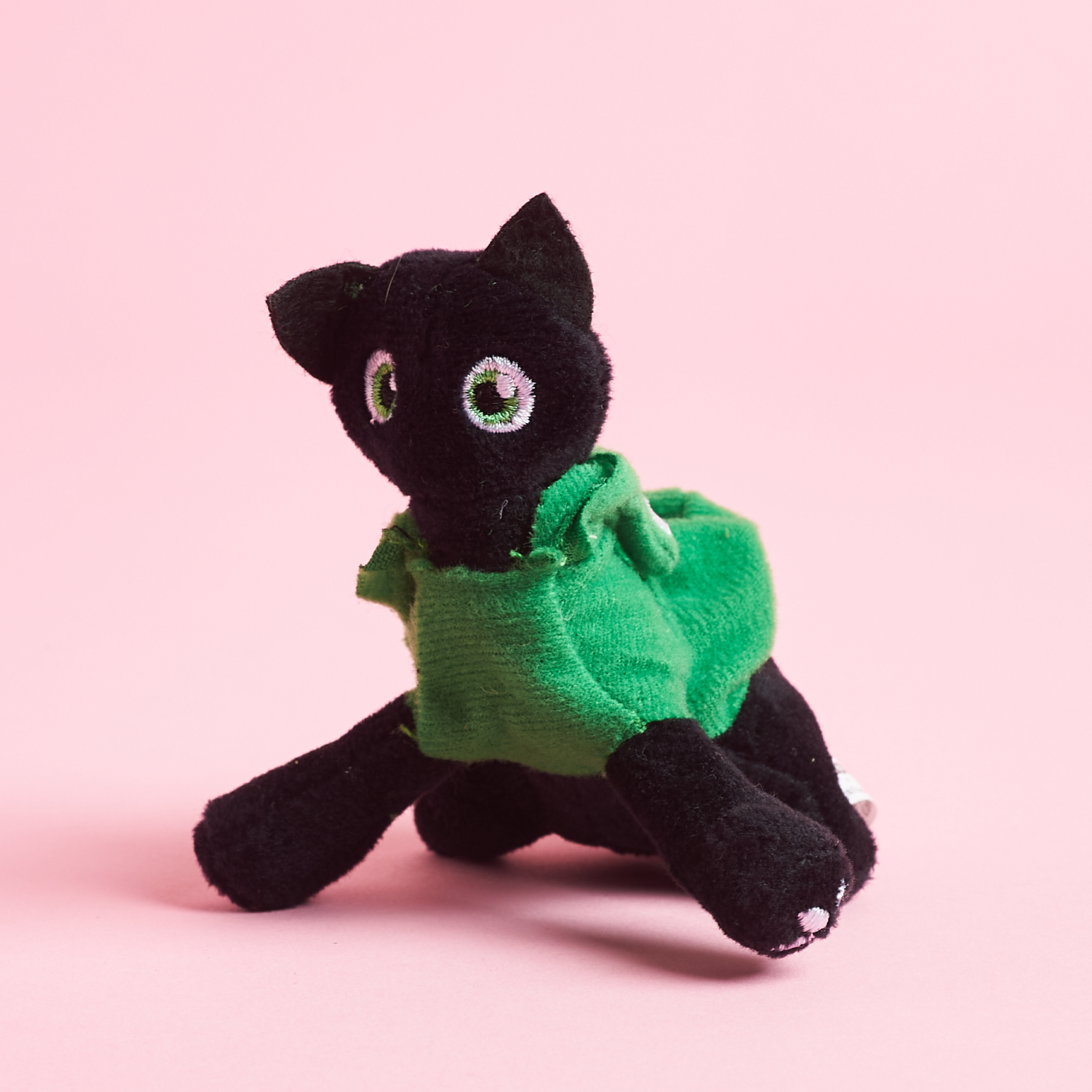 alternate view black cat toy wearing frog costume