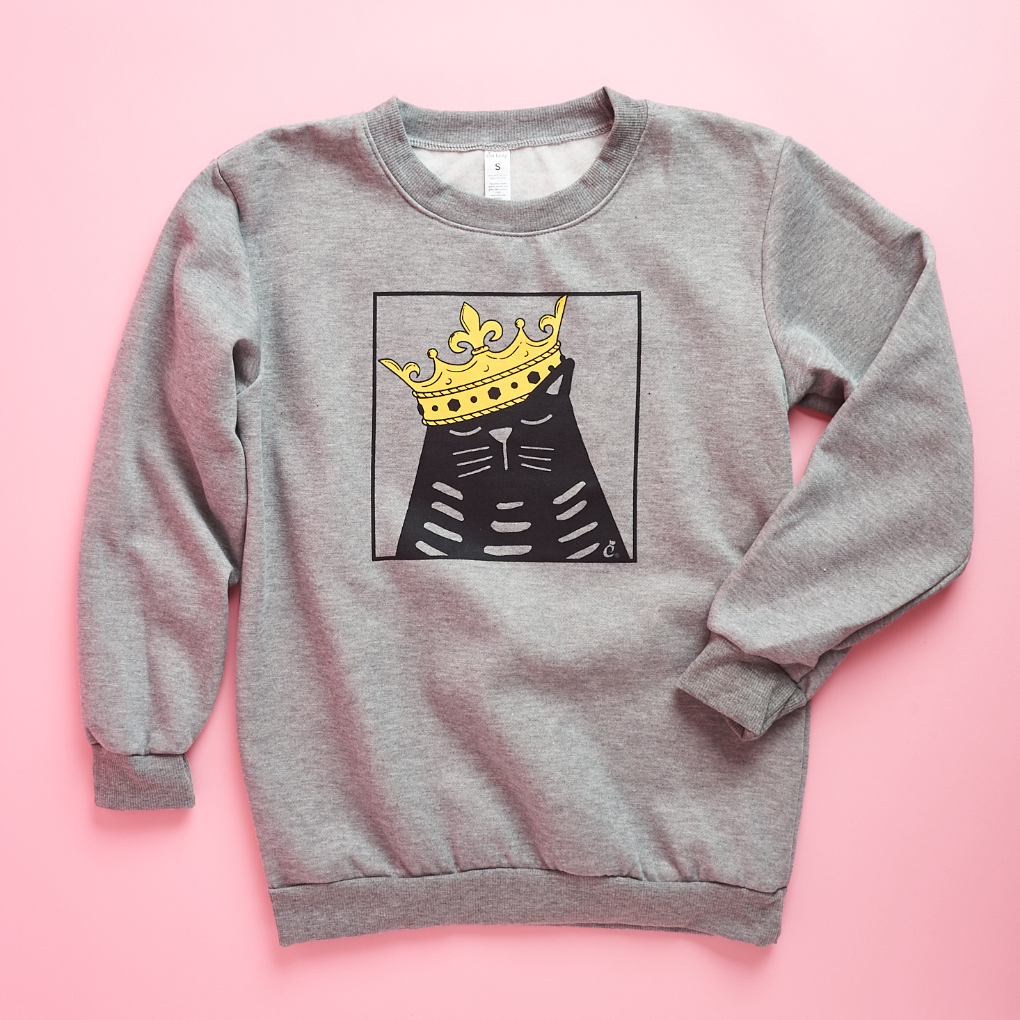 grey sweatshirt with black cat wearing crown