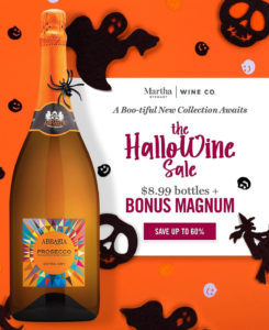 Photo of Hallo-Wine Sale ad from Martha Stewart Wine Co: a bottle of Abbazia Prosecco on orange Halloween background