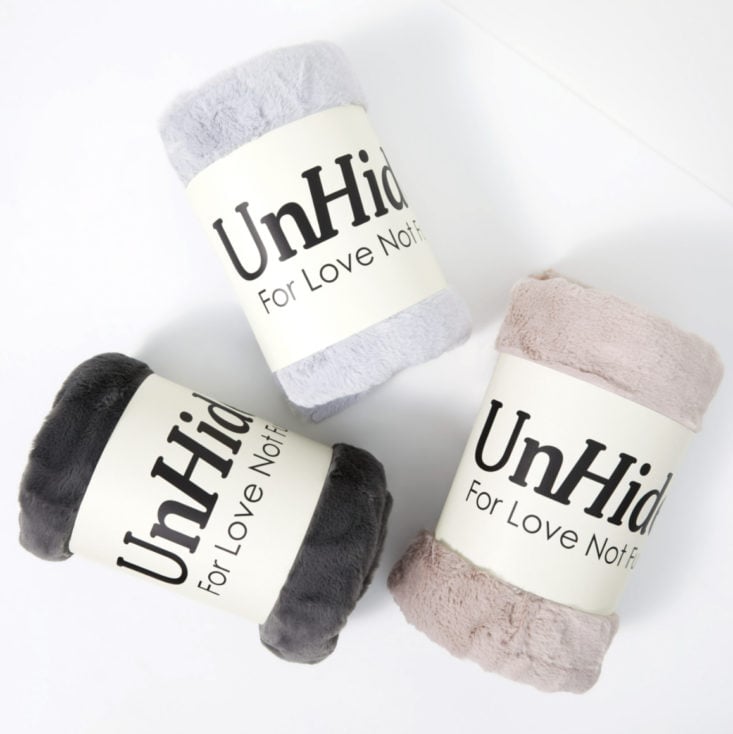 Photo of Unhide blankets in charcoal, rose and grey