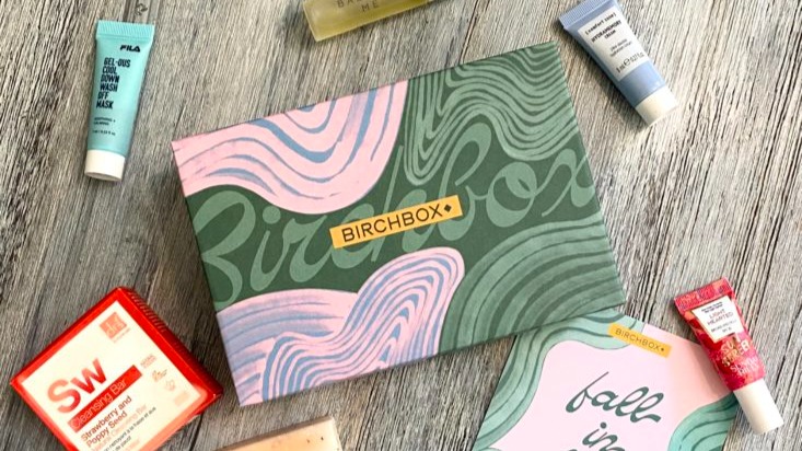 photo of closed Birchbox and various beauty products