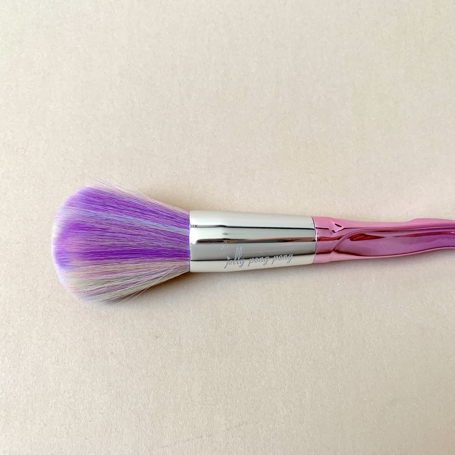 rainbow powder brush with silver hardware