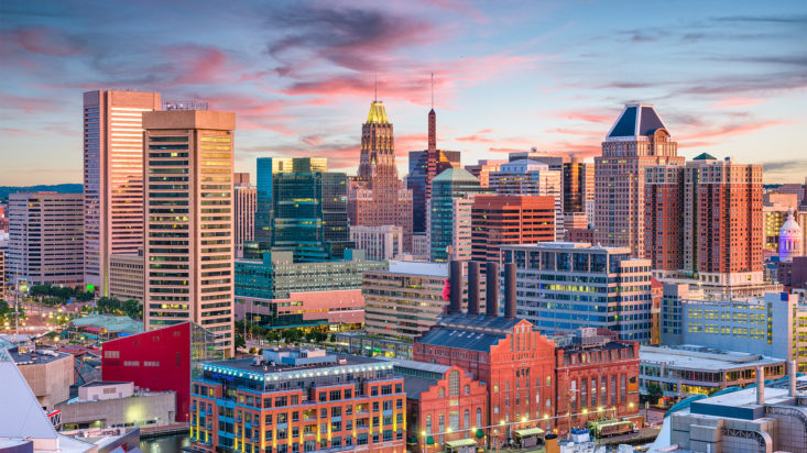 Baltimore, Maryland, USA Skyline over the Inner Harbor at dusk.