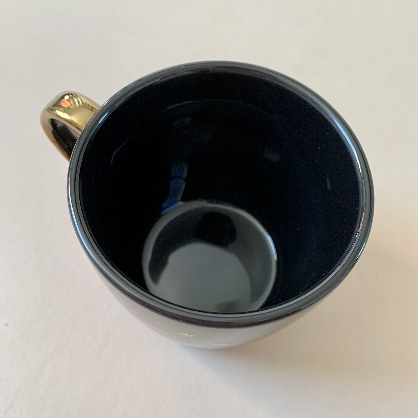 moon gazing black mug with gold accents