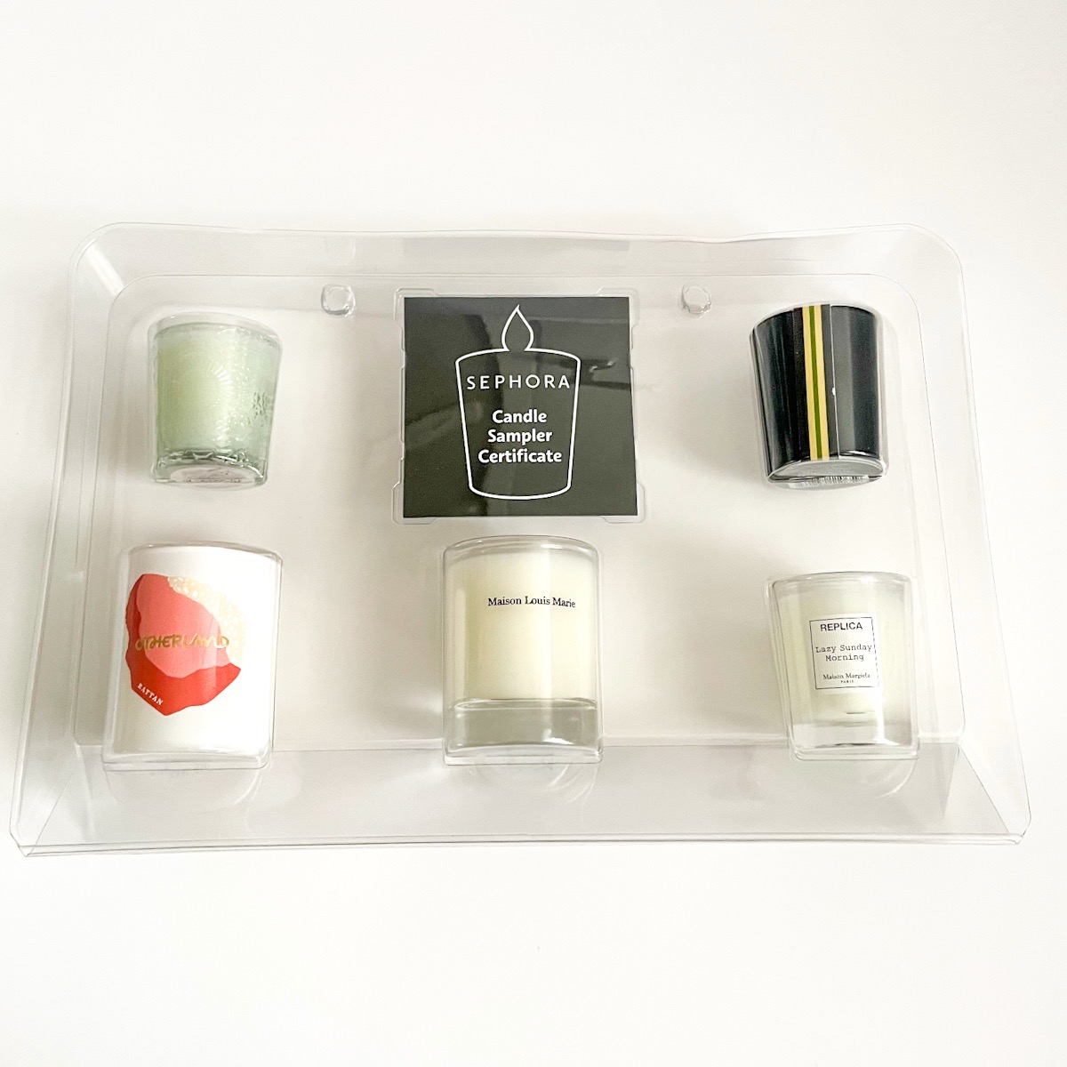 five candle notices nestled in protective plastic