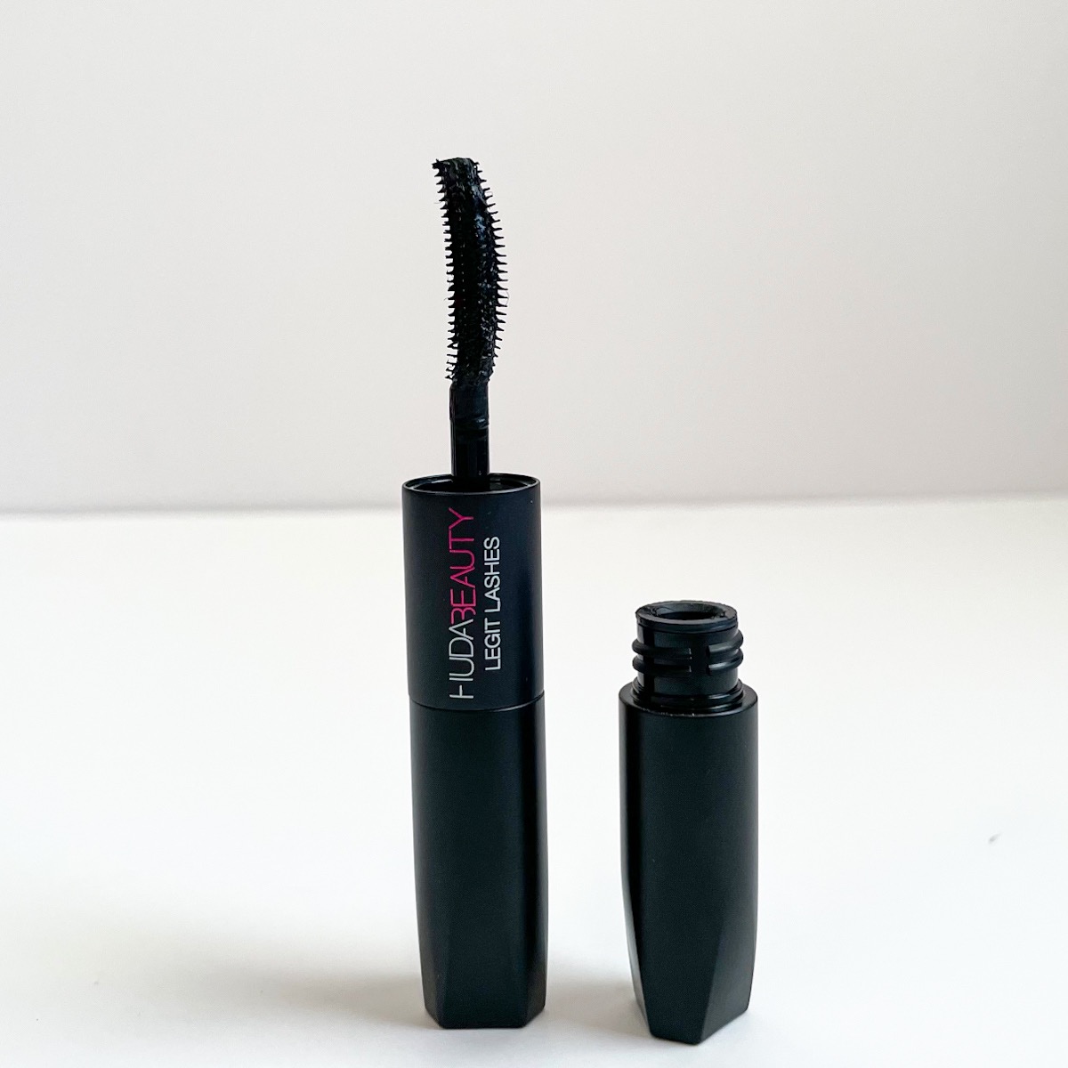 opened mascara showing curved wand