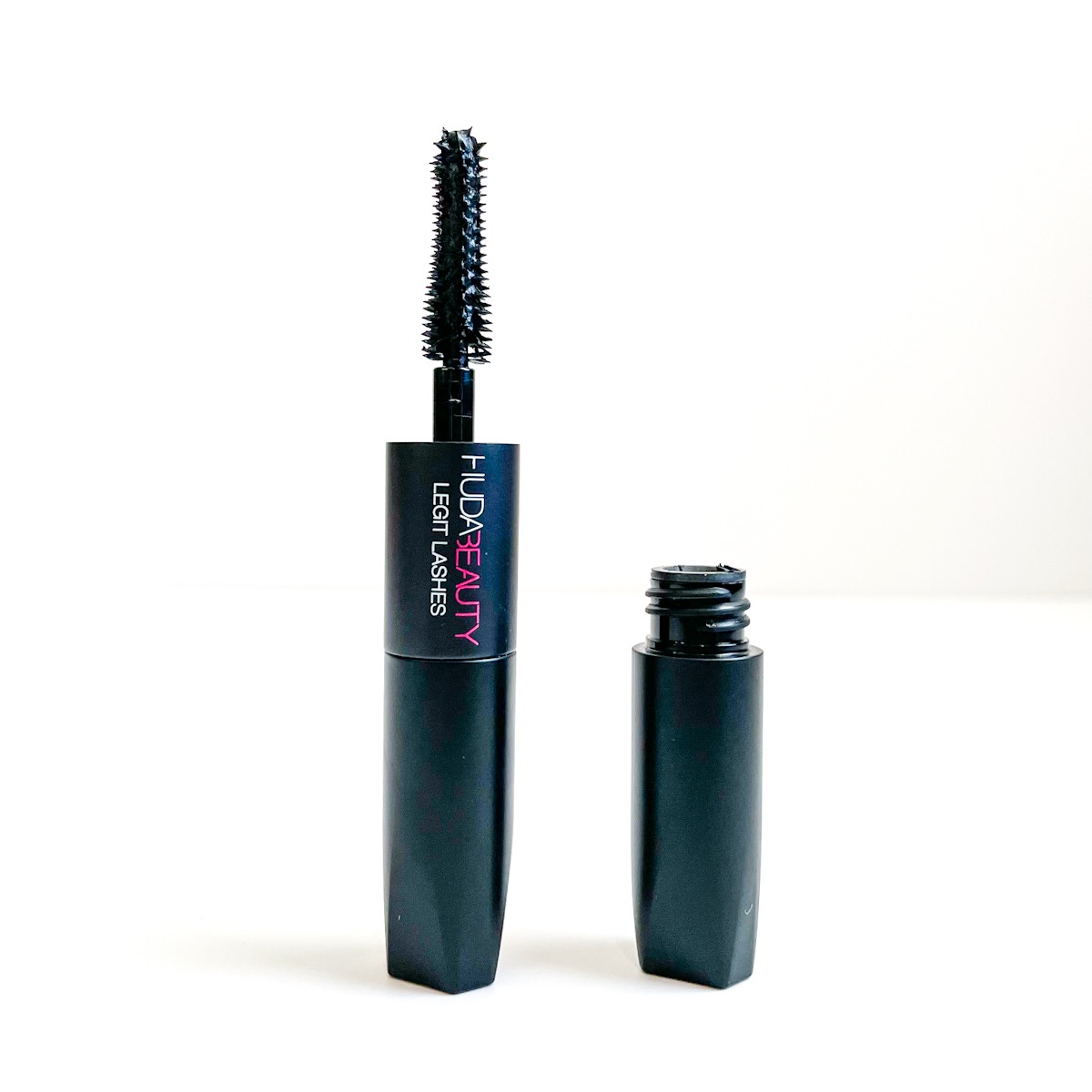 opened mascara showing narrowing mascara wand