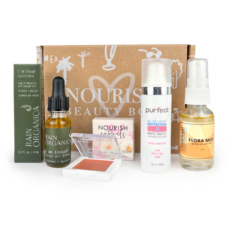 nourish beauty box with december items around it