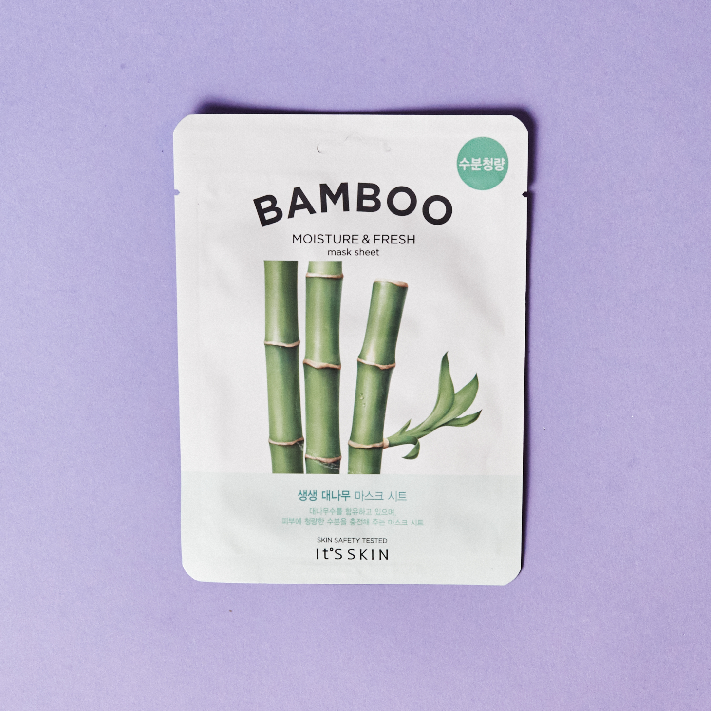 white sheet mask showing stalks of bamboo