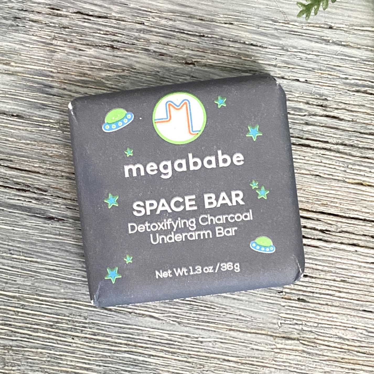 Front of Megababe Space Bar Detoxifying Charcoal Underarm Bar for Birchbox November 2021