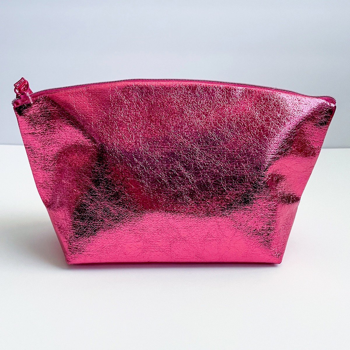 metallic pink makeup bag, closed