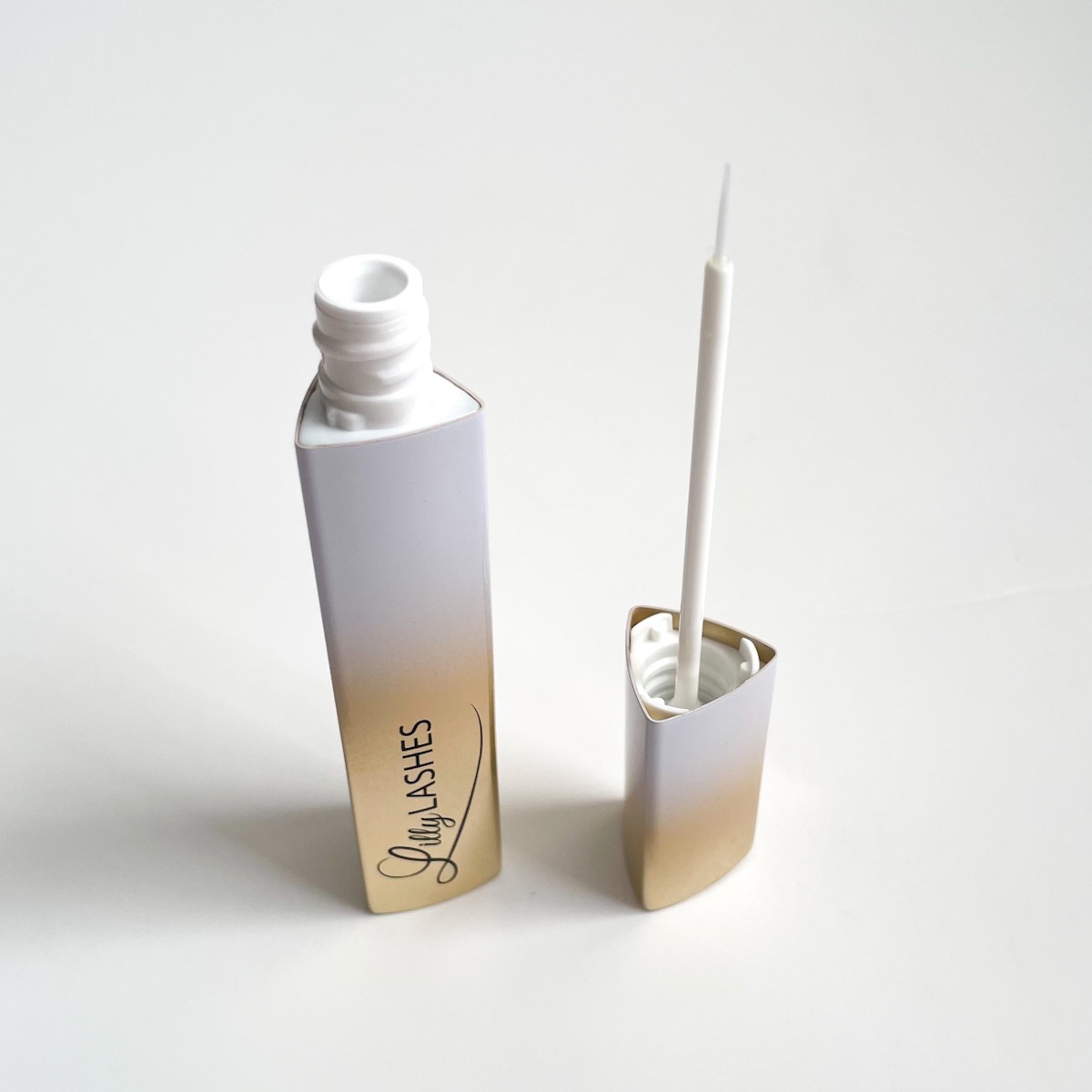 ombre gold and white lash serum, opened