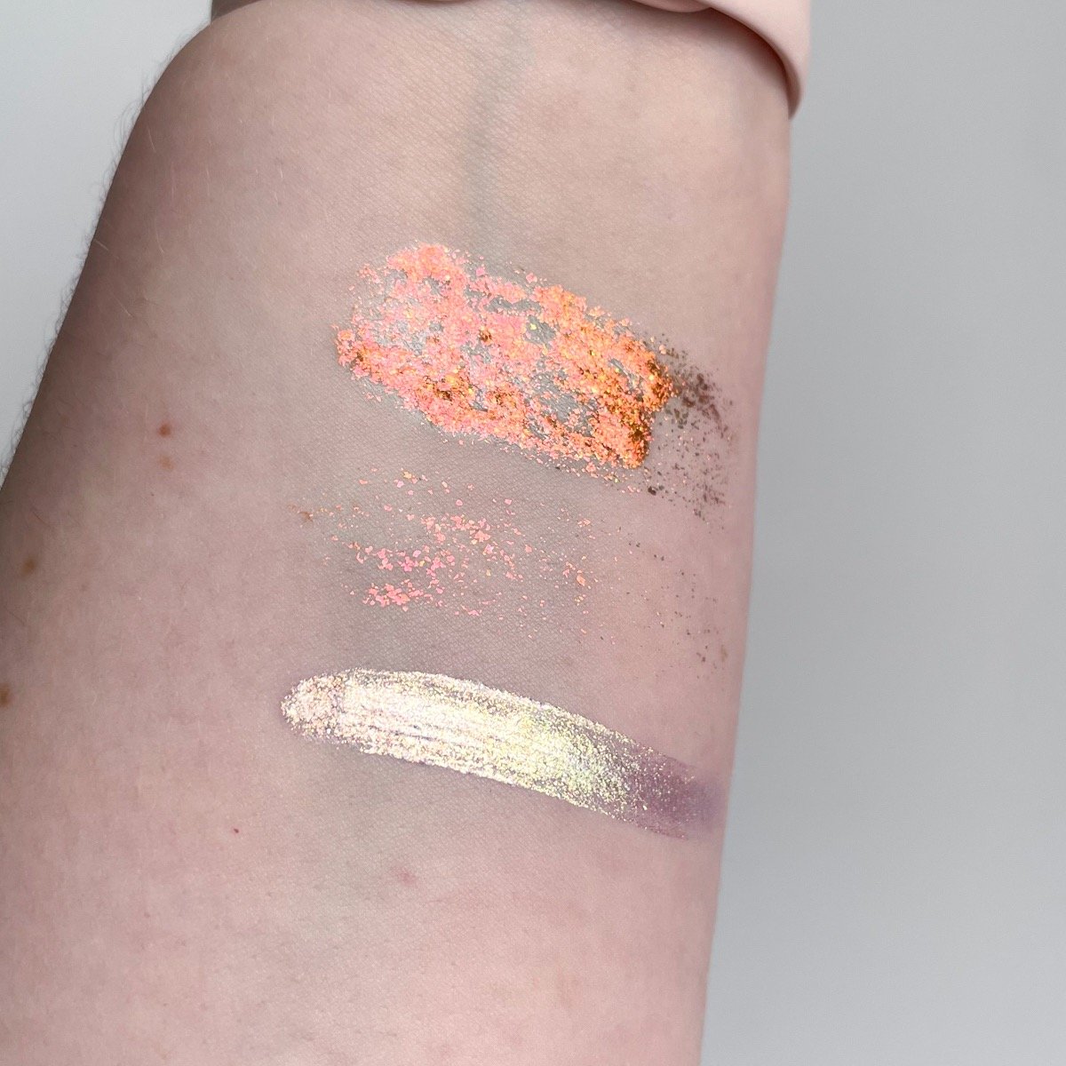 swatch of eyeshadows on arm