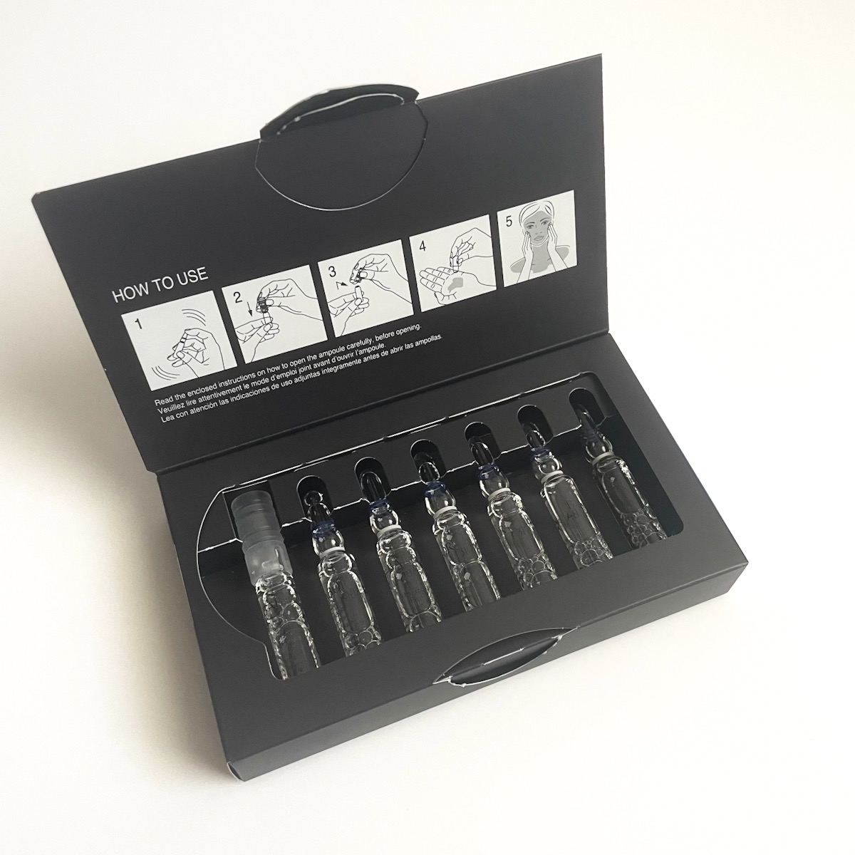 opened box showing 7 glass ampoules