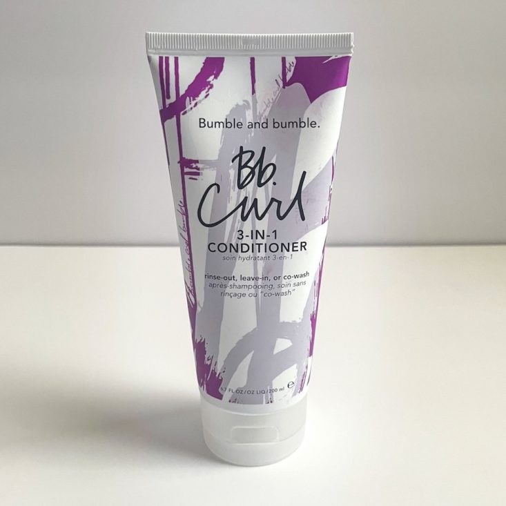 purple and white tube of conditioner