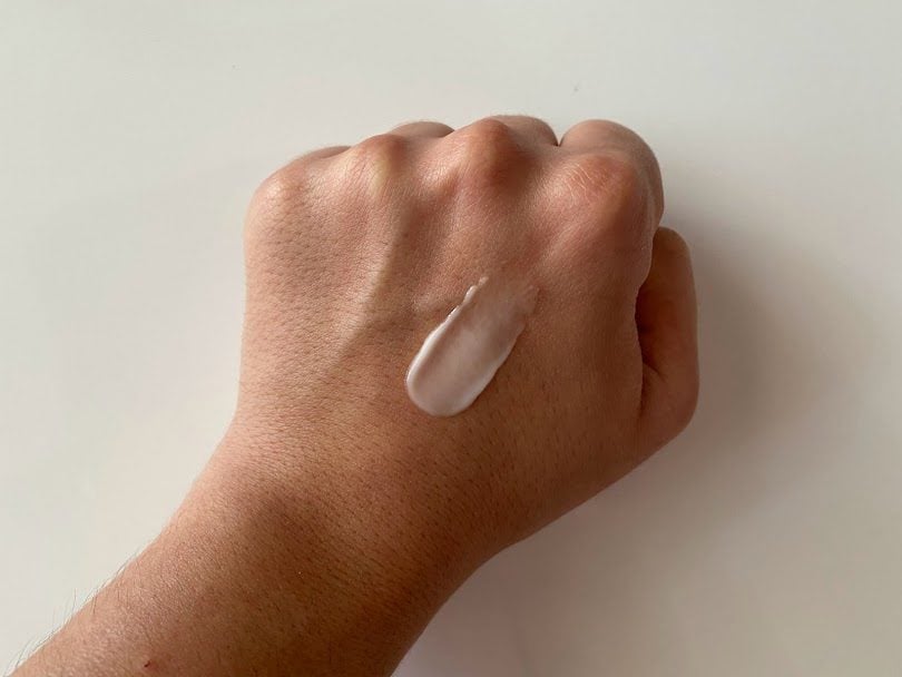 eyecream on the back of a hand