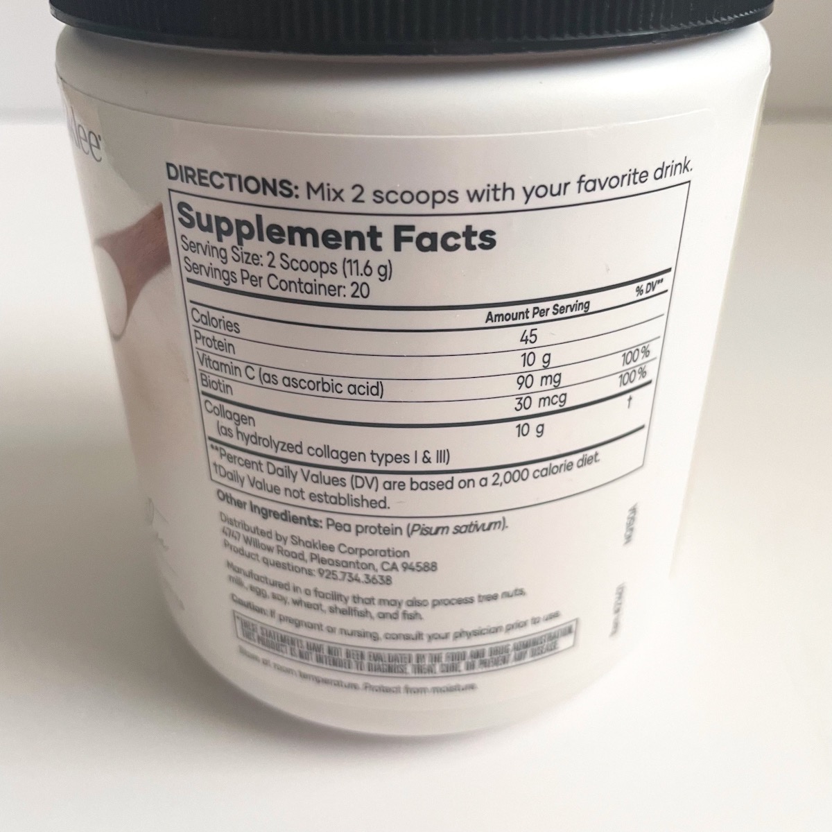 white tub of collagen powder showing nutrition facts