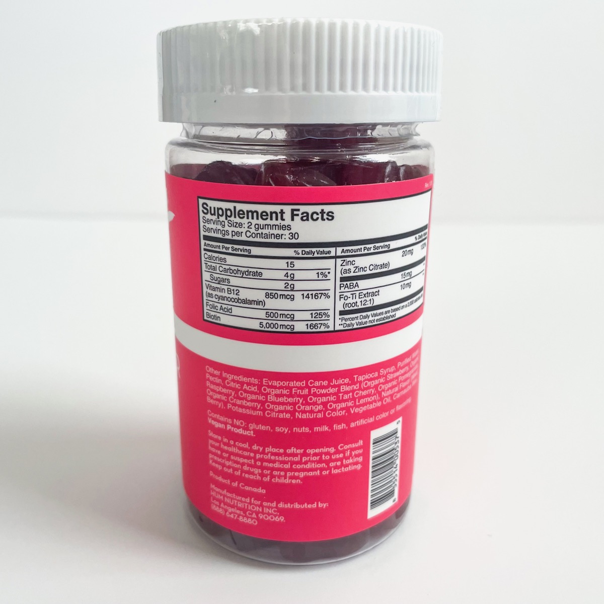pink bottle showing nutrtion label