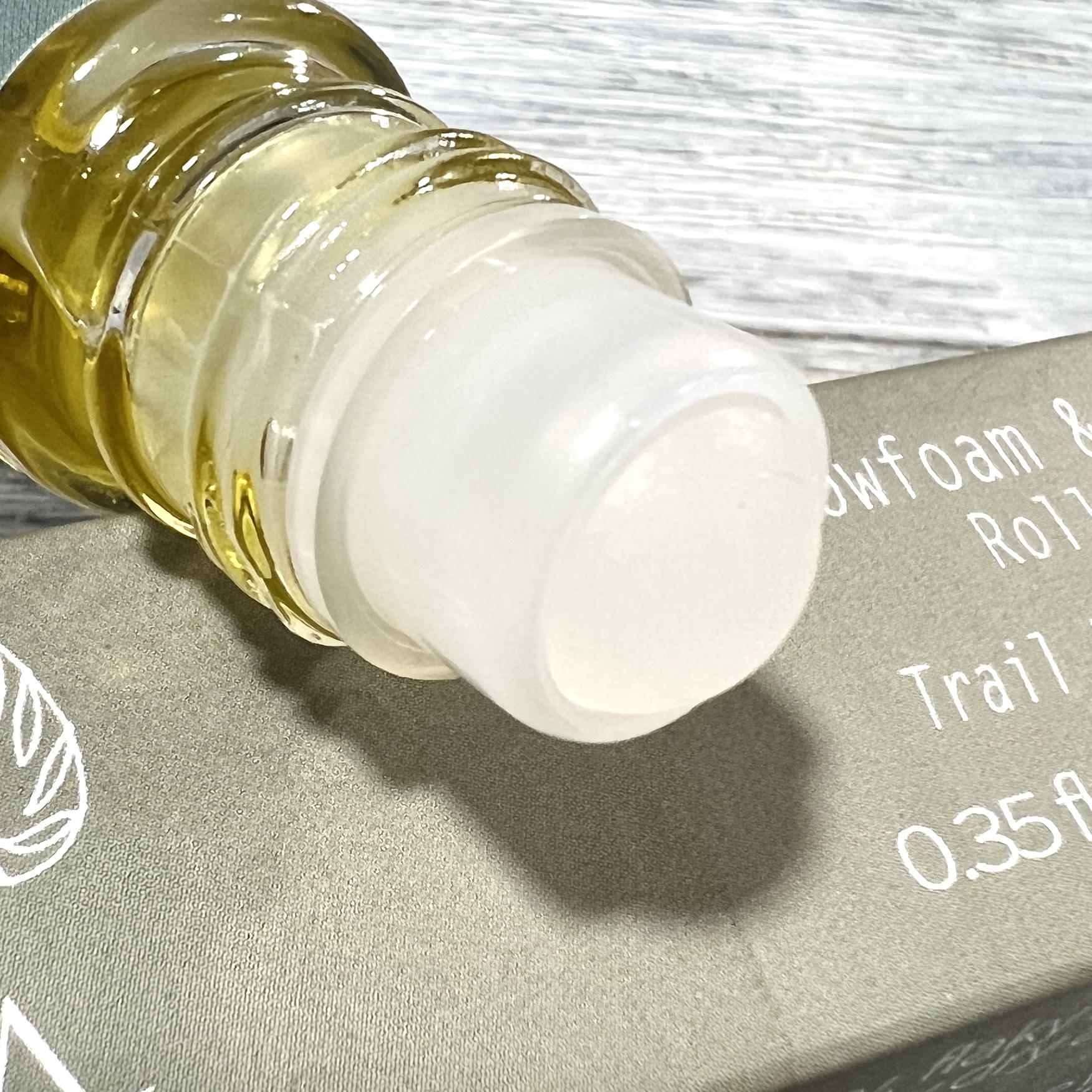 Closeup of Rain Organica Meadowfoam and Fog Roll-on Hand and Body Oil for Nourish Beauty Box January 2022