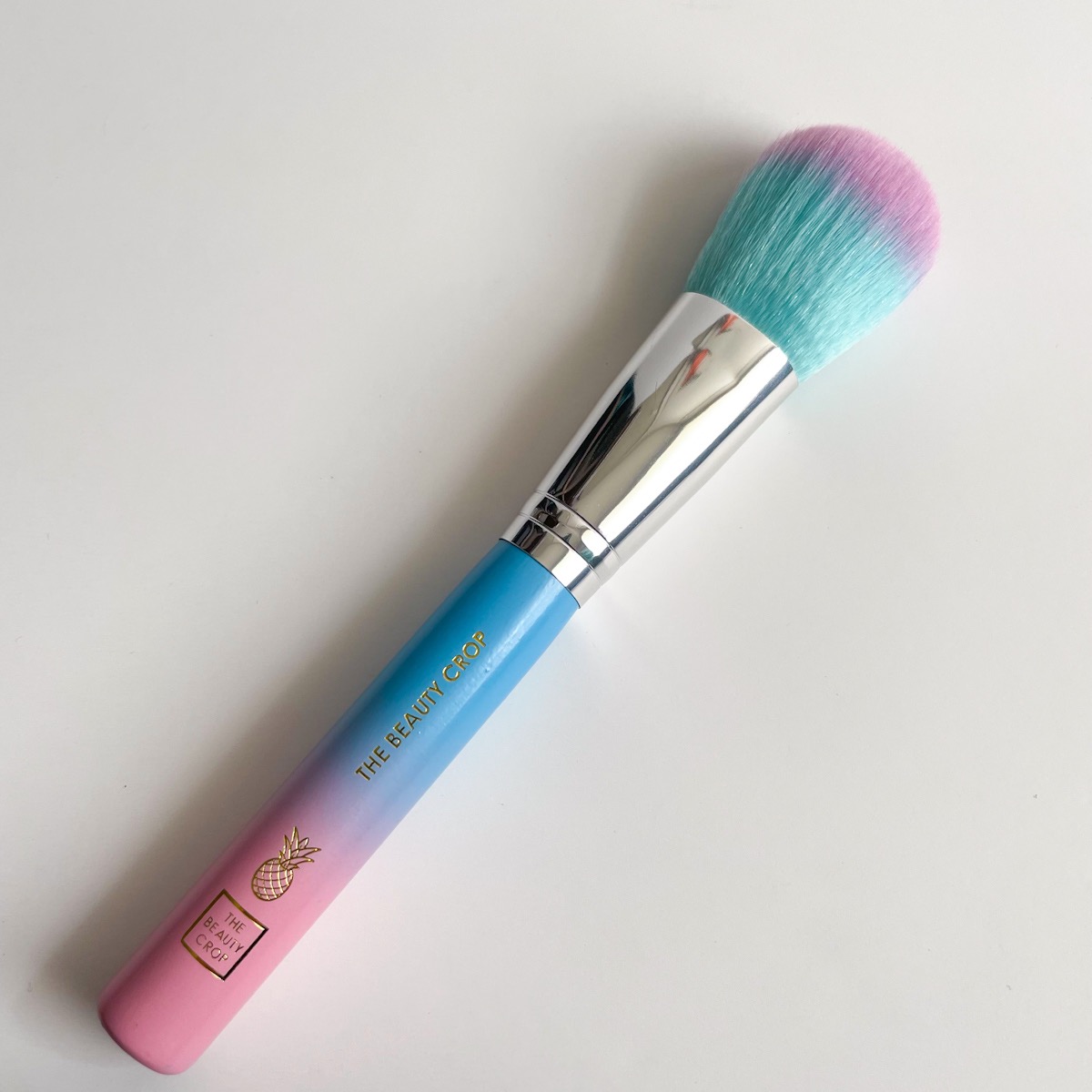 pink and blue ombre makeup brush