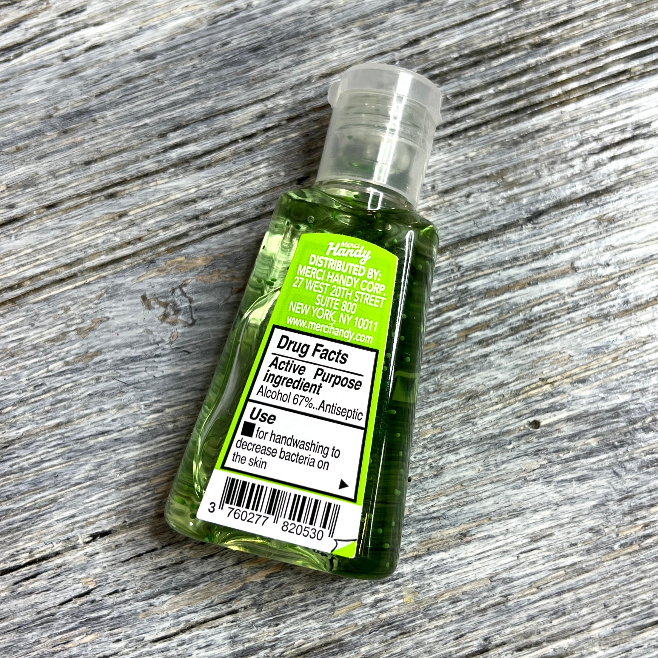 Back of Merci Handy Cross the Lime Hand Sanitizer for Birchbox December 2021