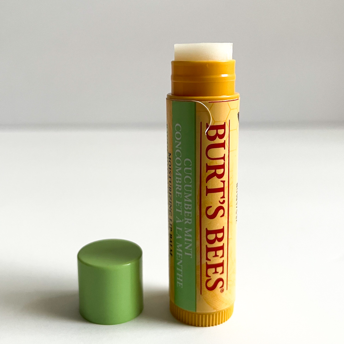 opened lip balm showing white texture