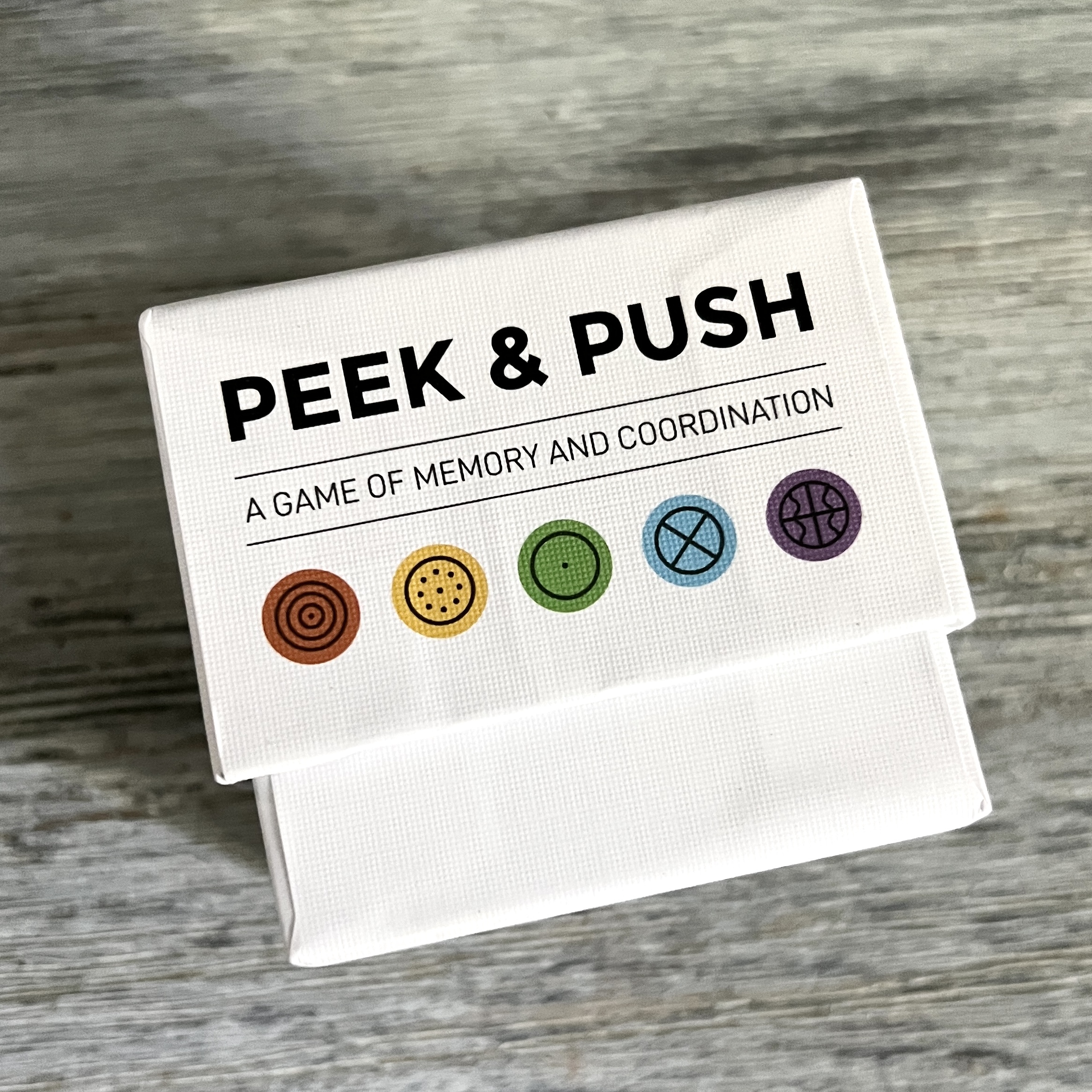 Front of Stellar Factory Peek and Push Game of Memory and Coordination for Bombay and Cedar Lifestyle Box November 2021