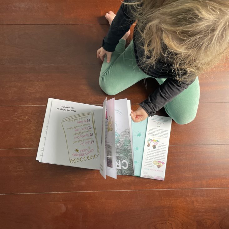 kid reading It Was Supposed to Be Sunny from Little Feminist Book Club