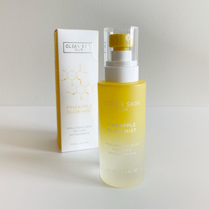 full size Clean Skin Club Pineapple Mist bottle with packaging in the background