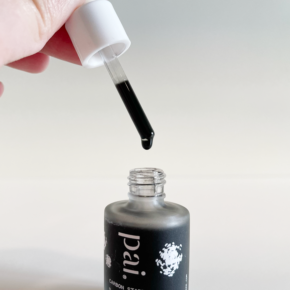 closeup of the dropper and oil from the Pai Carbon Star facial oil