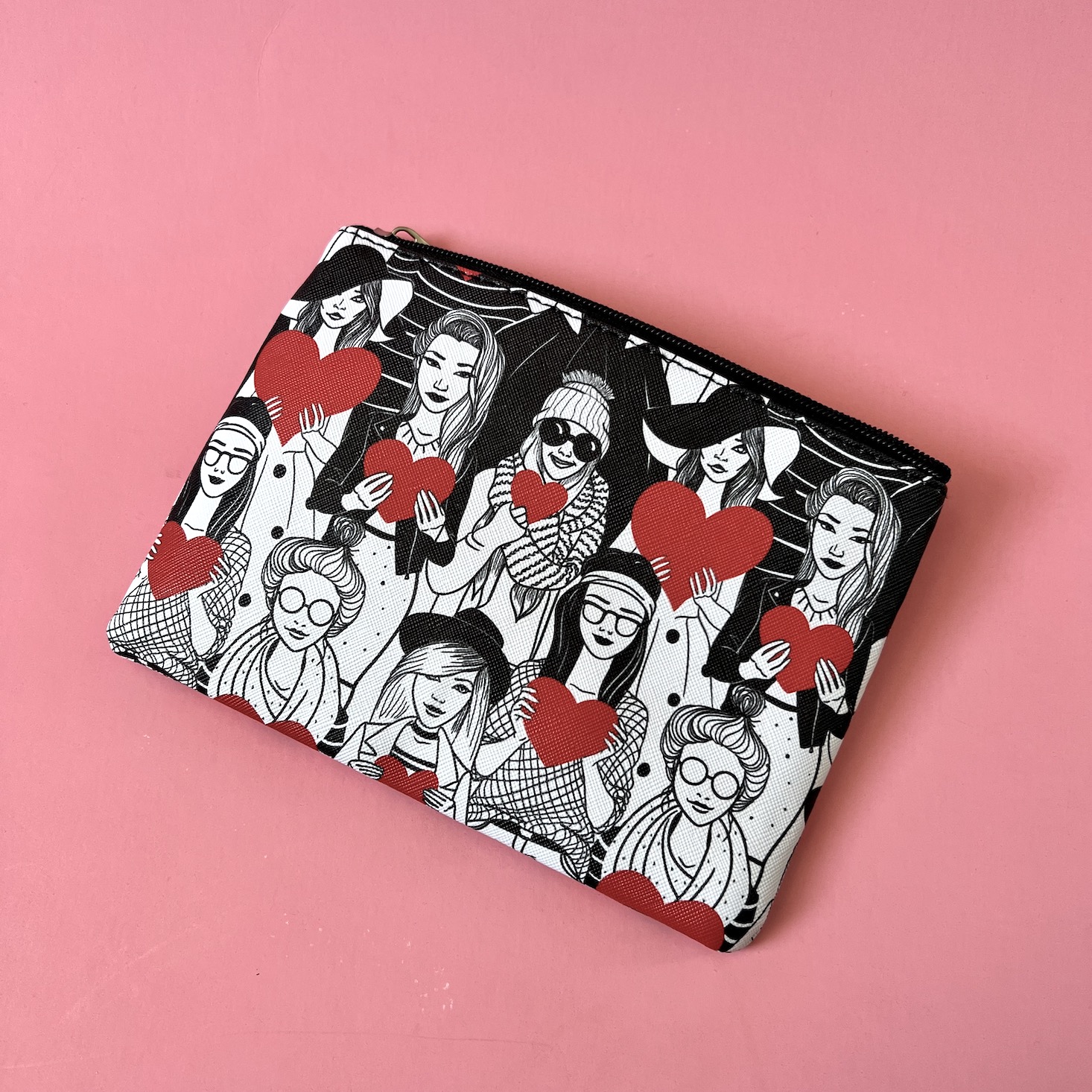 makeup bags, ladies holding red hearts