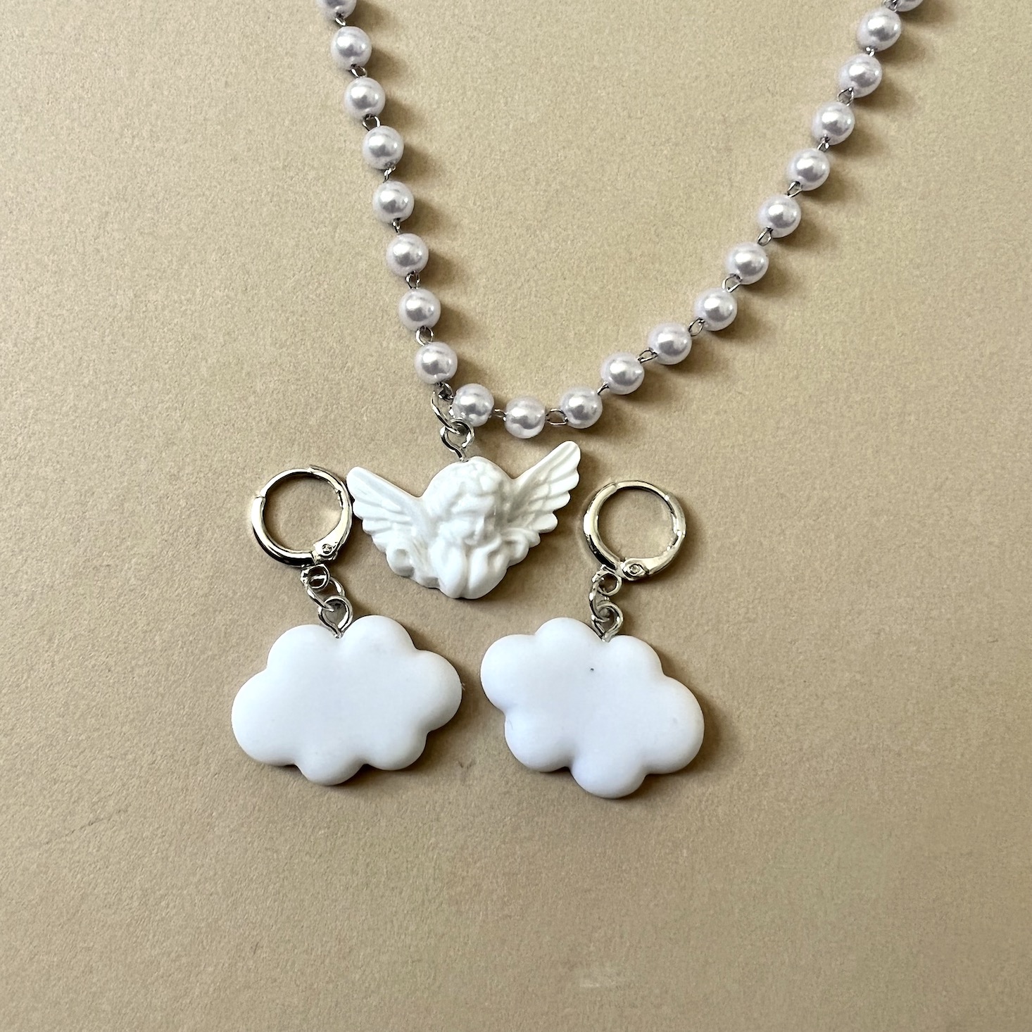 cupid necklace/cloud huge earring set