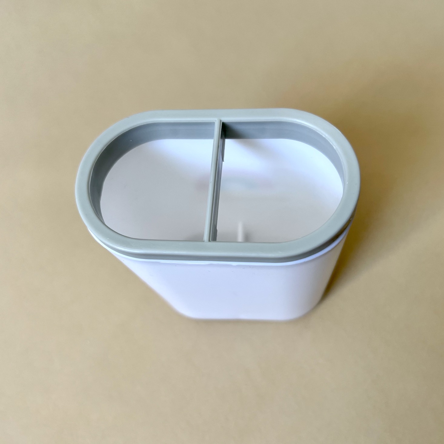 white container for utensils with rainbow