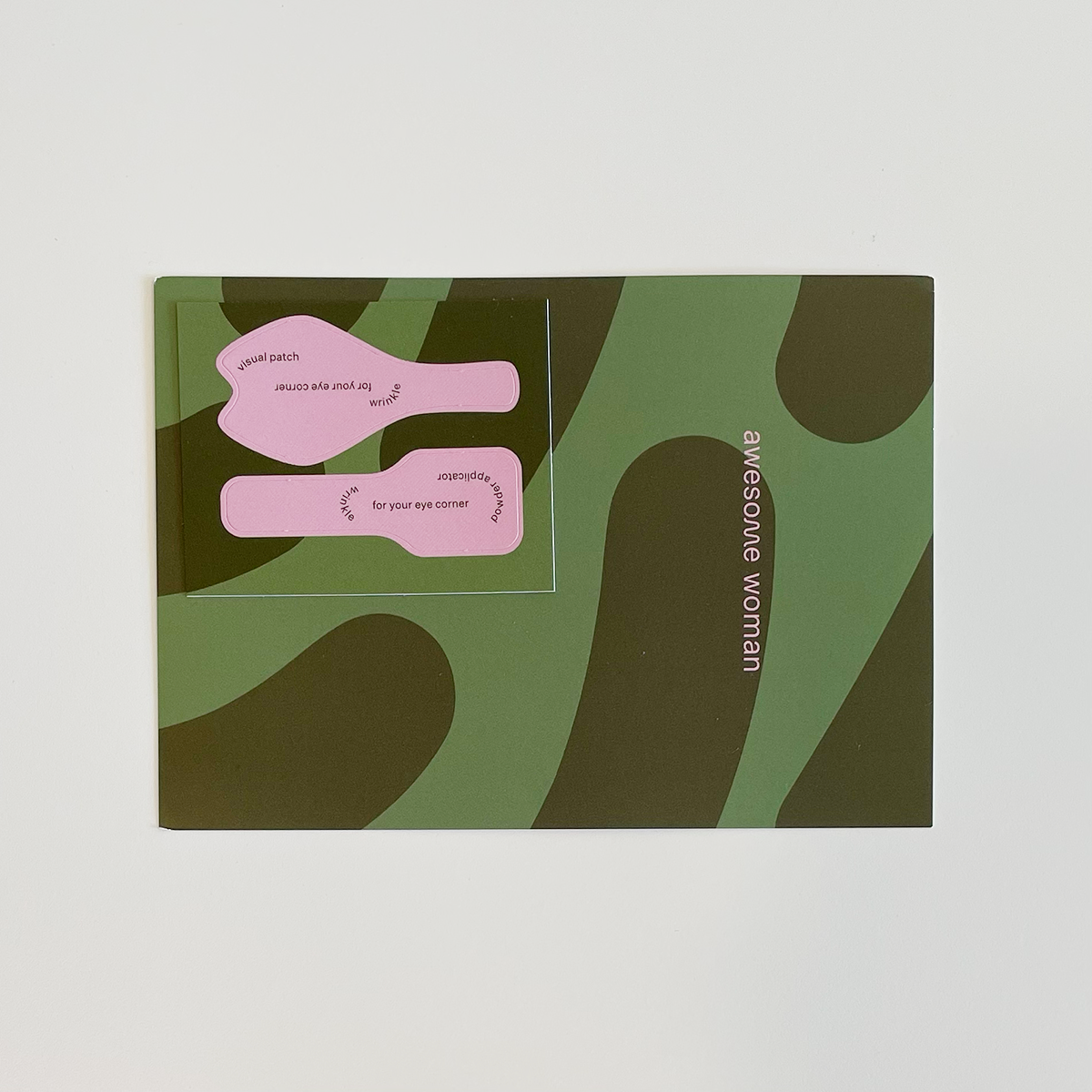 duo-tone green info card with wrinkle test strips