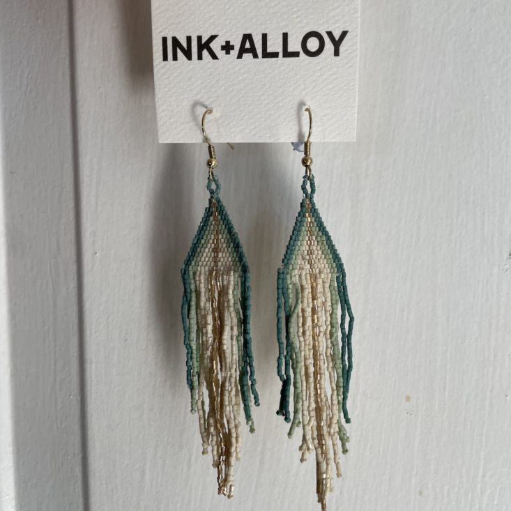 Ink+Alloy earrings on their card