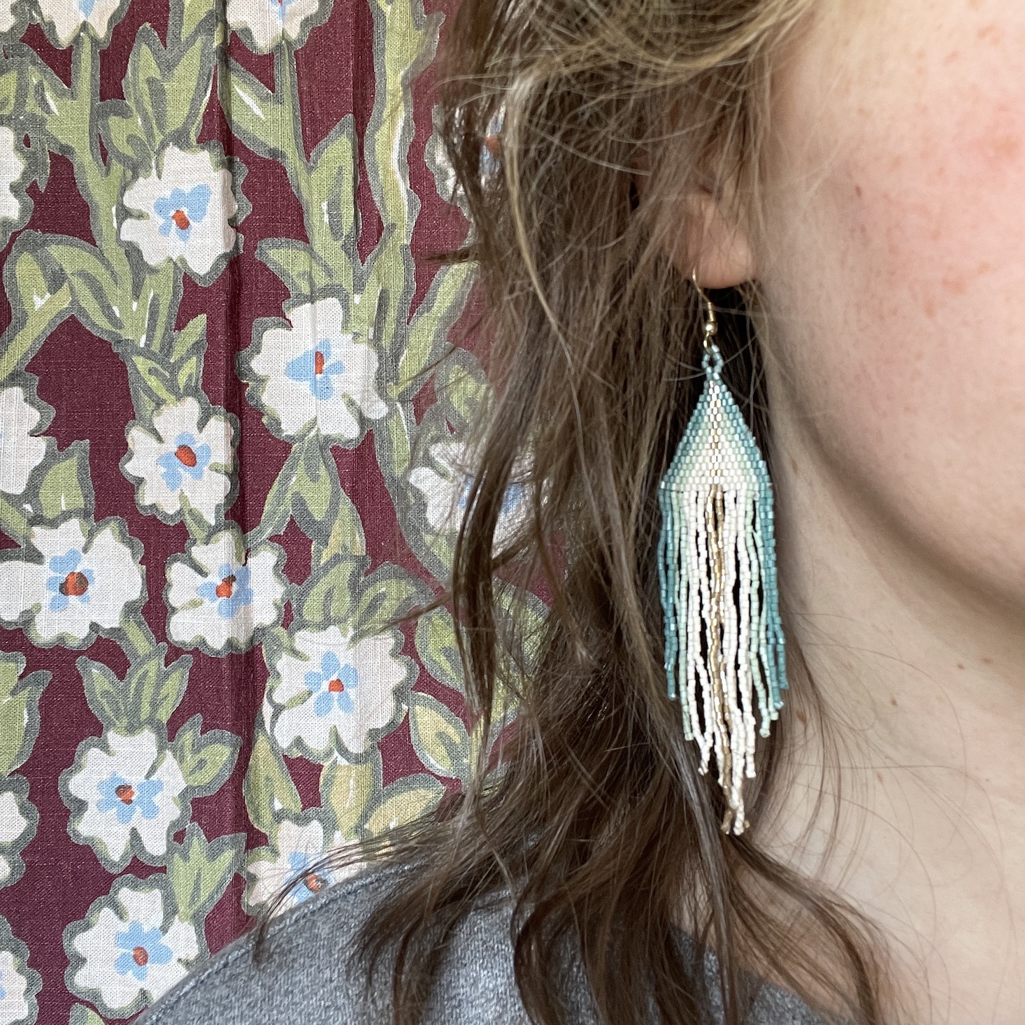 close-up of one Ink+Alloy earring