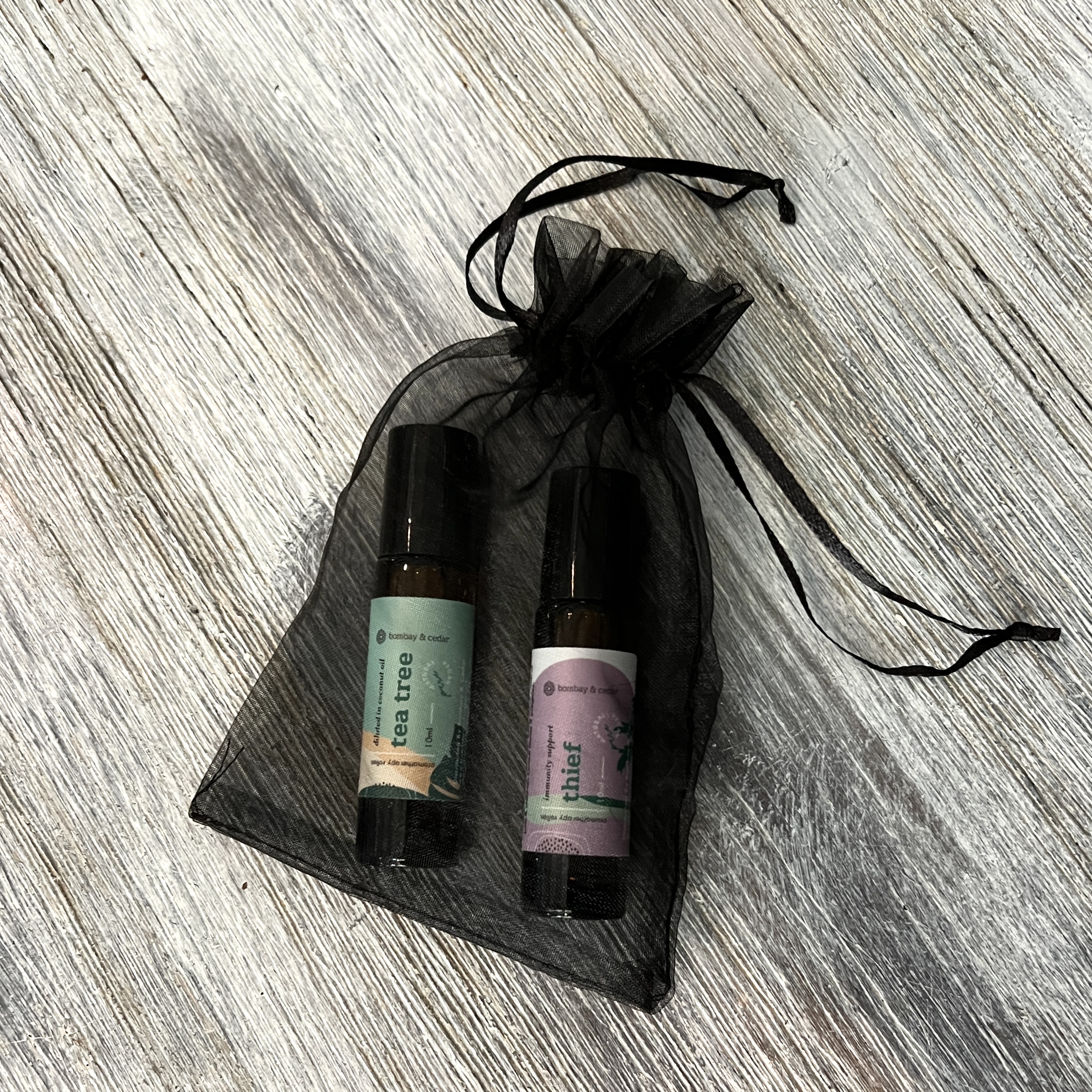 Front of Bombay and Cedar Essential Oil Roll-ons for Bombay and Cedar Lifestyle Box March 2022