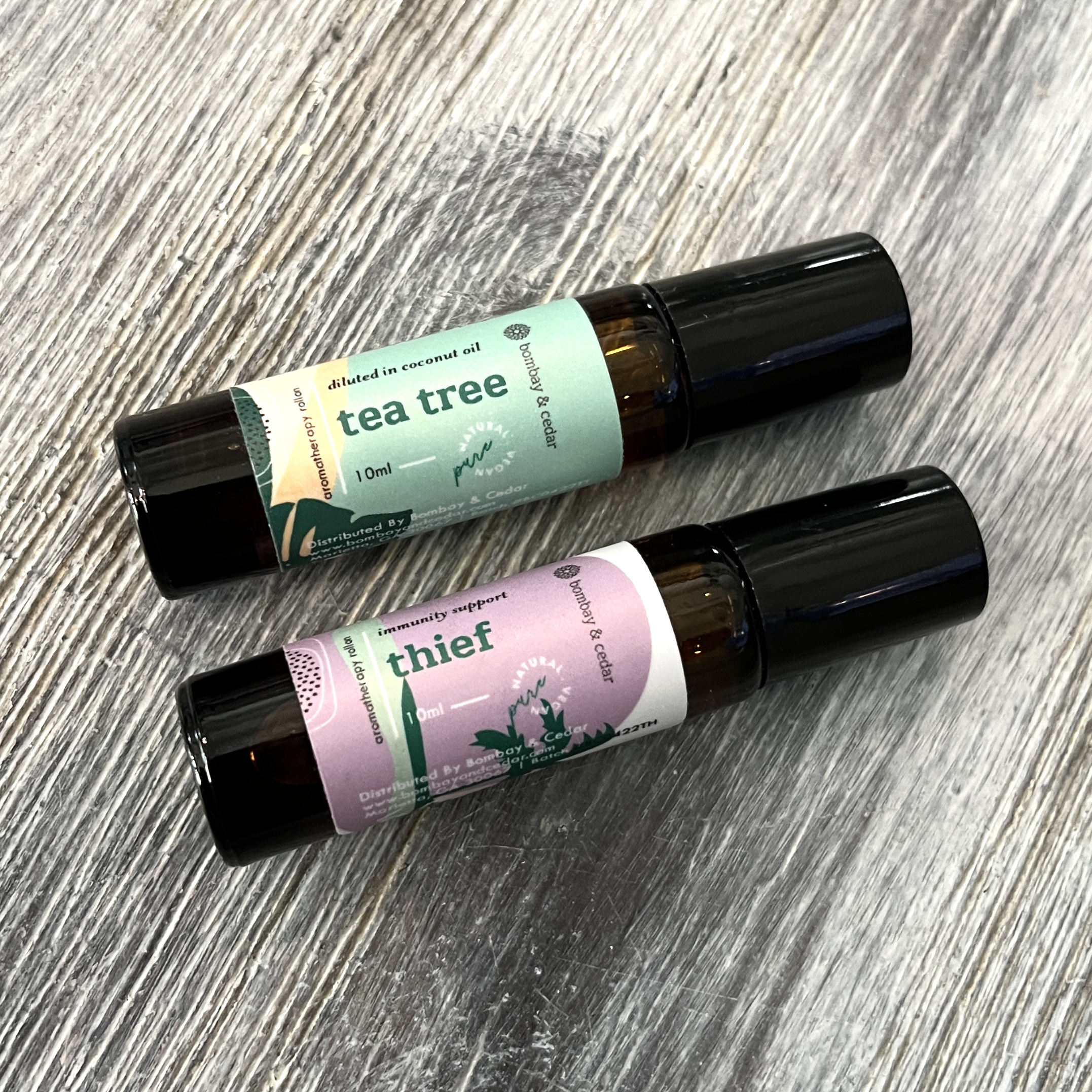 Front of Bombay and Cedar Essential Oil Roll-ons for Bombay and Cedar Lifestyle Box March 2022